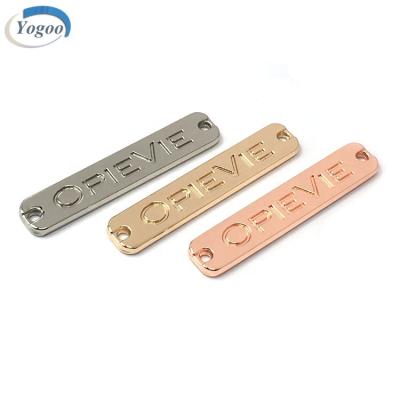 China Custom Metal Engraved Zinc Alloy Washable Washable Logo Label Apparel Tags For Swimsuit for sale