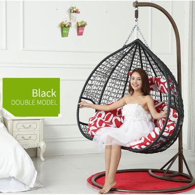 China Super Comfortable Outdoor Swing Chair Hanging Baskets Deep Cushion Metal Stand Leisure Egg Chairs Swings Garden Wicker Furniture for sale