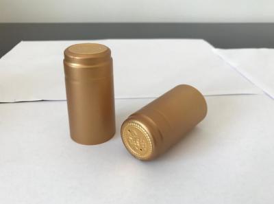 China Beautiful PVC Heat Shrink Capsule for Vodka Caps custom design black golden   PVC heat shrinkable film wine capsule for sale