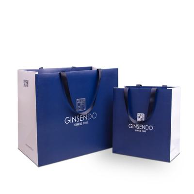 China 2021 New Materials White Card Recycled Packaging Custom Carrier Bag For Jewelry Packaging , Blue Shopping Customized Paper Bags With Silver Logo for sale