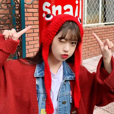 China COMMON Cute Girls Circle Basin Hat Big Eyes Frog Hat Black Head Warm Ear Cover Winter Protective Hat for sale