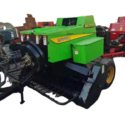 China Alfalfa agricultural machinery baler 19-year-old tractor-pulled 2*2 specifications are cheap and affordable and still in stock. for sale