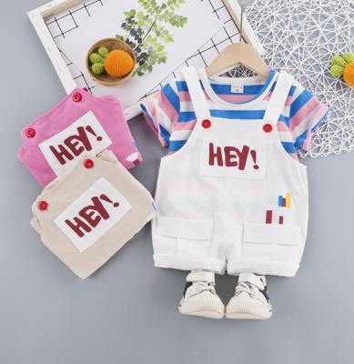 China Fashion/Comfortable Breathable/Formal Girl Clothes New Arrival Boutique Cartoon Printed Hey Words Designs Babies Clothing Sets Summer 2022 for sale