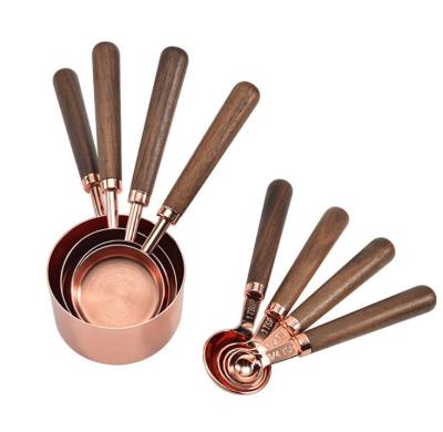 China Sustainable Measuring Tools Stainless Steel Cooper Gold Measuring Cups And Spoons Set With Walnut Wood Handle for sale