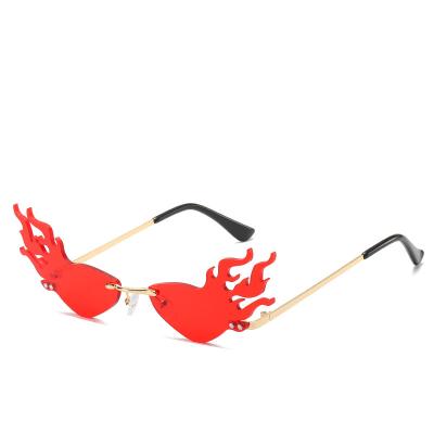 China Luxury Trendy Rimless Fire Flame Sun Glass Shades Women Eyewear Designer Women Fashion Sun Glasses Small For Lady for sale