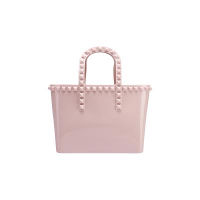 China Custom Portable Multifunctional Fashion Bucket Silicone Rivet Shopping PVC Tote Bag for sale