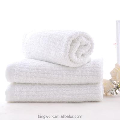 China Factory direct sales hotel towel full cotton beauty salon white compressed hotel towel soft water - absorbing hairdresser towel for sale