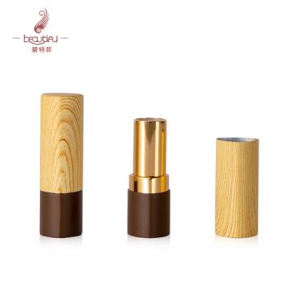 China Cosmetic triangle shaped empty aluminum lipstick tube, custom wooden grain decoration lipstick cases, lip balm container for sale