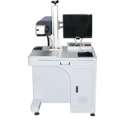 China Laser Jeans Cloth Spotting Laser Engraving Machine 30W CO2 Laser Spotting Machine for sale