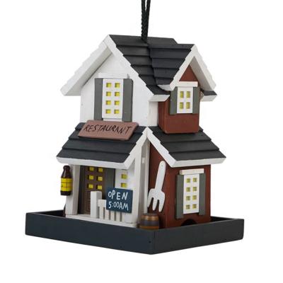 China Colorful Hanging Bird Feeder Garden Country Cottages Wooden Bird Feeder Sustainable for sale