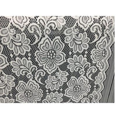 China Embroidery textronic 150 cm scalloped French floral stretch lingerie rigid raschel lace fabric for bridal dress garment for sale