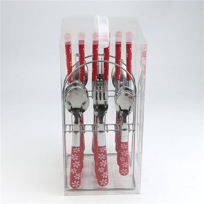 China Sustainable Red Plastic Flower Printing Handle Sendok Stainless Steel Flatware for sale