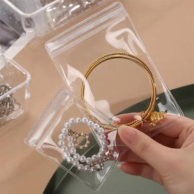 China Transparent Recyclable Plastic Clear Security PVC Zipper Bag For Cosmetic Jewelry Ring Packaging Zip Lock Pouch for sale