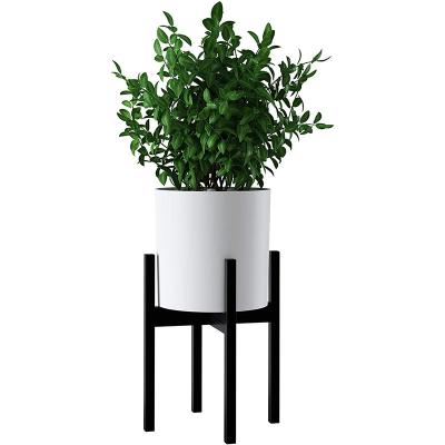 China Modern Living Room Balcony Iron Indoor Floor To Ceiling Flower Stand Plant Modern Minimalist Shelf Metal Flower Pot Cross Rack for sale