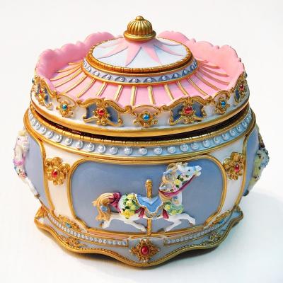 China Polyresin factory wholesale polyresin figurine carousel music box for sale