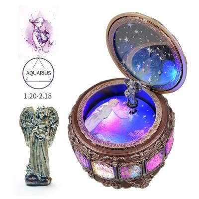 China Hot sale Polyresin 12 constellation musicbox retro roll up music box for sale