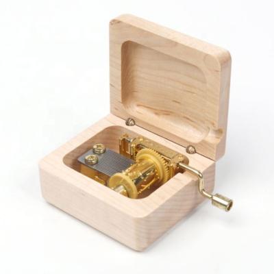 China Hand Crank Music Box Carved Logo Wooden Music Box with Custom Song for sale