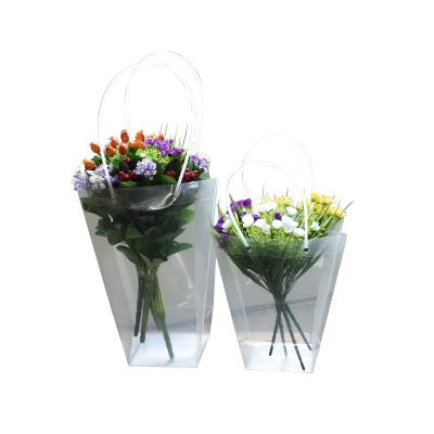 China Moisture-Proof Plastic Bouquet Wrapping PVC Gift Carrier Flower Bags For Flower With Handle for sale