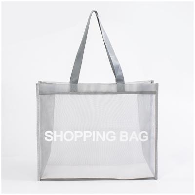 China Customized Fashion Durable Logo Large Transparent Nylon Mesh Shopping Bag Reusable Net Tote Bag for sale