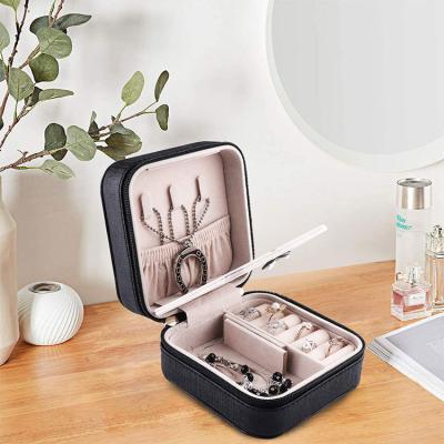 China Polyester; Nylon; Oxford; Leather; Tangle Free Organizer Jewelry Bag Travel Jewelry Case Supplier Storage Bag Leather Suede Organizer Jewelry Box Travel Case for sale