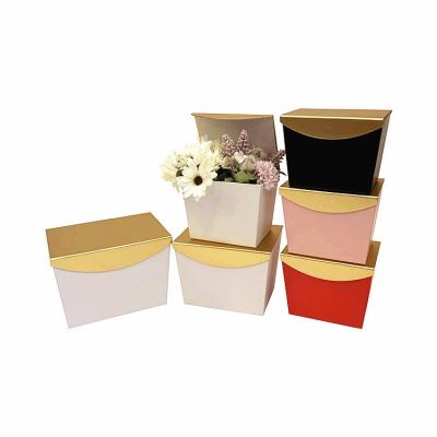 China Recyclable Simple Design Trapezoidal Gold Gift Box Cover Frame Style Recyclable Insist Hangcheng Holiday Rectangular Wedding Cake With Hand Gift Box for sale