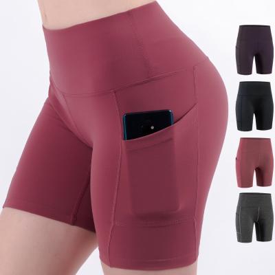 China Breathable High Waist Yoga Shorts Tummy Control Workout Running Athletic Shorts With Pockets Sport Wear For Women for sale