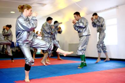 China Las series al por mayor de los artes marciales suelan las esteras profesionales del Taekwondo del tatami del tkd de la estera de Eva en venta