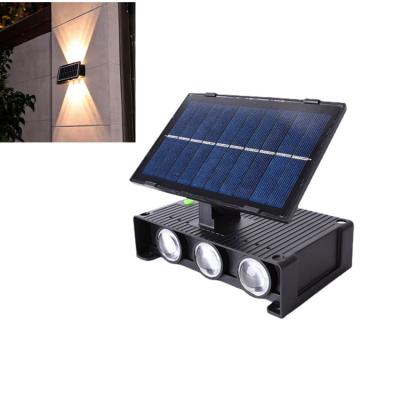 China Garden Atmosphere Decoration LED Solar Wall Light Outdoor Porch Garden Patio Up and Down Luminous Solar Lights for sale