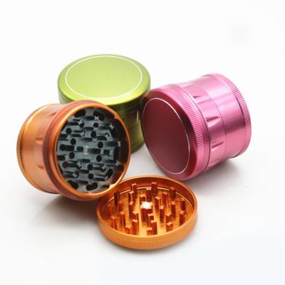 China CNC Sharp Teeth OEM Wholesale 2.5inch LOGO Chamfering Grinder Herb Grinders 63mm Aluminum Alloy for sale