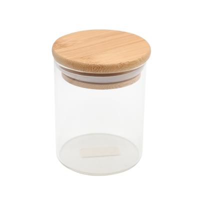 China 2020 Hot Sale Eco-friendly Glass Jar With Bamboo Lid Herb Glass Container With Custom Logo for sale