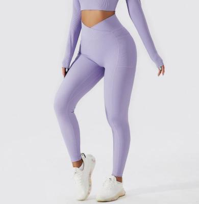 China Breathable STOCK 9Colors Seamless Knitted Yoga Pants Sports Fitness Pants Crossover Waist Sexy Women Leggings for sale