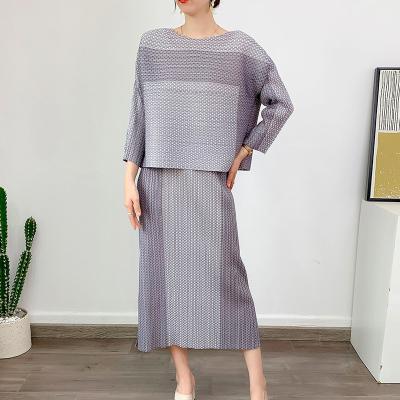 China Custom Made 2023 Ladies Turtle Neck Knit Top And Skirt Set Womens Clothing Knit Midi Skirt Set Two Piece Fishtail Outfit for sale