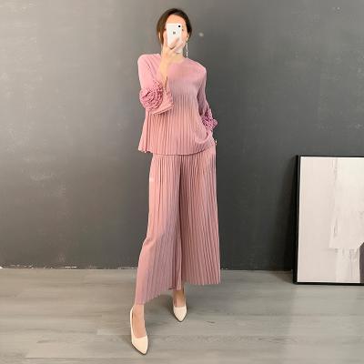 China Fashion Women Suit Breathable Pleated Bubble Sleeve Round Collar Top Wide Leg Pleats Please Two Piece Set for sale