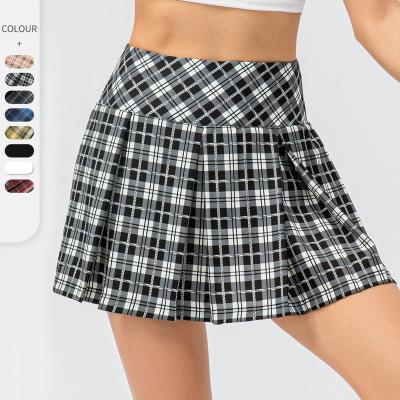 China Wholesale 77%/23% Polyester Spandex With Pocket Side Sports Pleated Skirt High Waist Tummy Control 2 In 1 Design Yoga Tennis Skirt for sale