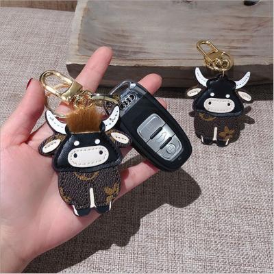 China Promotion Chinese Zodiac Flower Calf Keychain Cartoon Men And Women Car Keychain Bag Pendant Old for sale