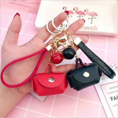 China Korean Cute Female Small Leather Foreskin Rope Key Bag Bag Key Chain Ring Pendant for sale