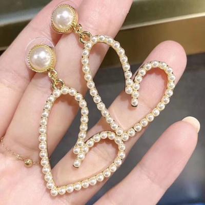 China Trendy Big Heart Crystal Round Pearl Fashion Stud Diamond Circle Earrings for sale