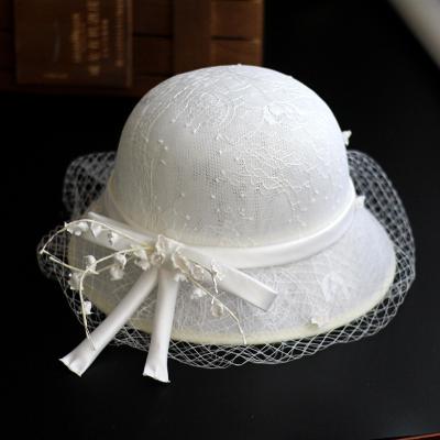 China Graceful Silk Dobby Bride Photography Flower Bow Hat With Mesh Veil Custom Wedding Party Hat for sale