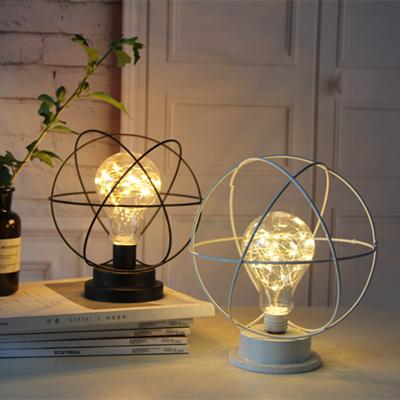 China Modern Led Colorful Metal Table Lamps Illusion Moder Table Lamps For Indoor Bedroom for sale