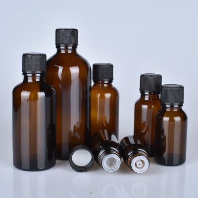 China High Qiality Newly Empty 5Ml 10Ml 15Ml 20Ml 30Ml 50Ml 100Ml Amber Glass Essential Oil Bottle With Orifice Reducer And Tamper-Evident Caps for sale