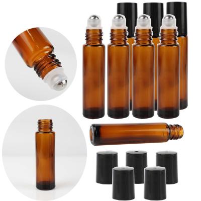 China Wholesale Empty High Qiality Mini Travel Glass Bottles Stainless Steel Roll Tube Clear Amber Perfume Essential Oil Glass Roll On Bottle for sale