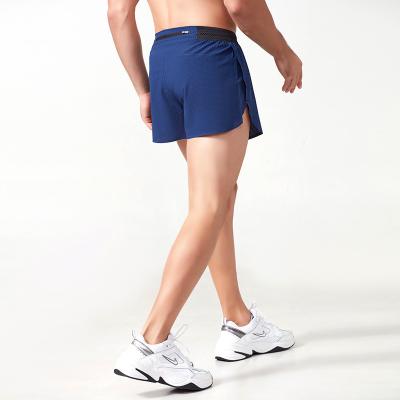 China Men's Summer Sports Breathable Shorts Anti-go Quick-drying Minute Pants Training Naked Track Loose Field Fitness Three-way Running for sale