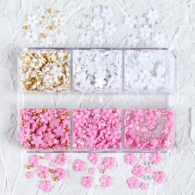 China DIY Small White Flower Nail Art Jewelry with 3D Steel Balls Nail Art Accessory Resin Flower Decoration for sale