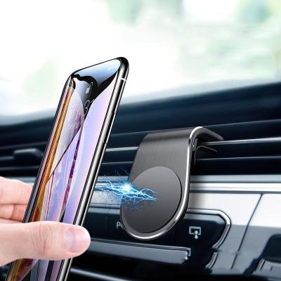 China Portable Mini Metal Car Air Vent Adjustable Mobile Phone Holder Strong Magnetic 360 Degree Rotation Phone Holder For Car for sale