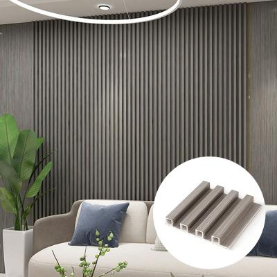 China JIUYIXING Soundproof High Quality Interior Decorative Classic Waterproof Wood Grain Wpc Wall Panel For Bedroom for sale