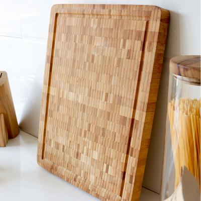 China Large Sustainable Thick Rectangular Non-Slip Bamboo Butcher Cutting Plate Cutting Board For Vegetables Fruit Meat for sale