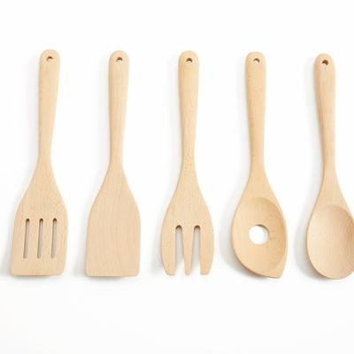 China Eco-Friendly Sustainable Beech Wood Kitchen Utensil Set Solid Spatula Spoon Notched Spoon Food Turner Fork Hole Spoon Set for sale