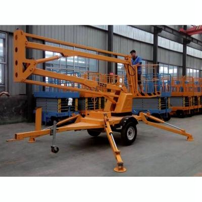 China Machinery Repair Shops Towable Boom Lift 16m Hydraulic Cargo Lift Work Platform for sale