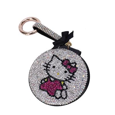 China Fashion import rhinestone mirror enlarging main chain cartoon mirror double-sided small portable makeup mirror for sale