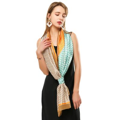 China Polyester satin silk triangle ladies scarf spring and fall geometric oversized quilled long scarf for sale